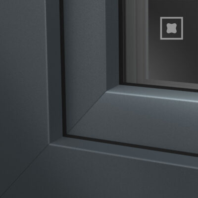 Schiefergrau Matt Ecke eines modernen Fensters mit dunklem, glattem Metallrahmen. Augenmerk auf hochwertige Verarbeitung und elegantes Design.